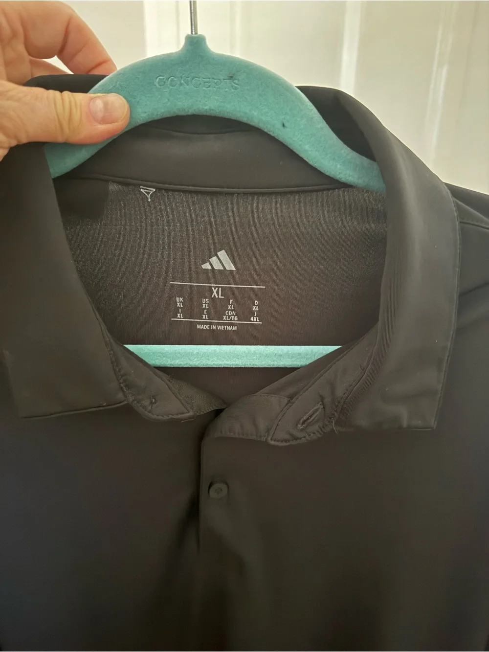 Adidas men's polo size XL.  Black.  Excellent condition.